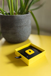 Unpluq Tag in packaging box