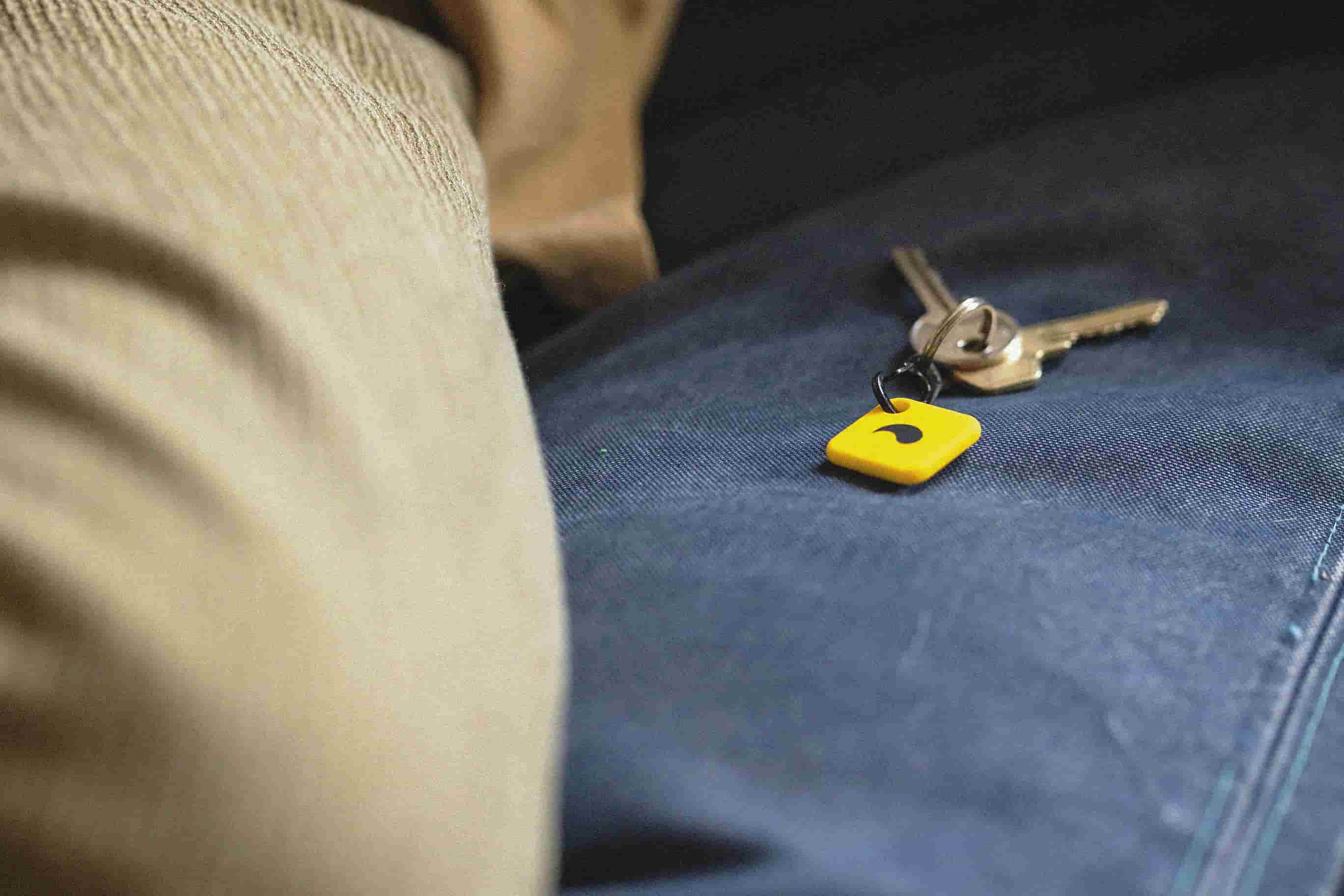 Unpluq Tag on couch